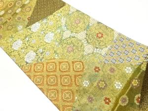 切り嵌め風華文に花唐草・紗綾形模様織出し袋帯